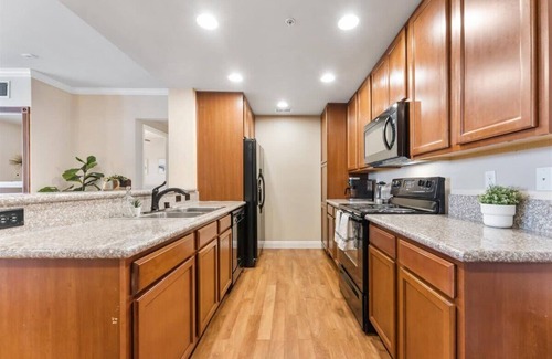 Reno/Tahoe Airport Apartment | 2BR Getaway Pool, Gym, Basketball Court & Theater