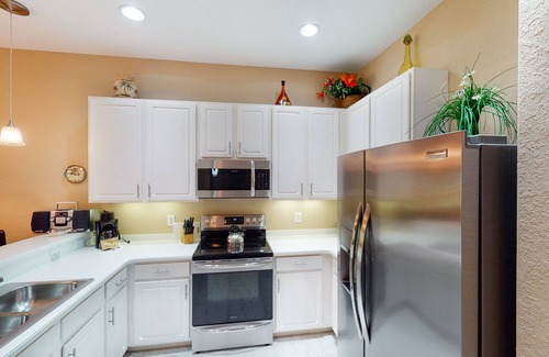 Bahama Bay Condo | 2nd floor condo w/pools, restaurant, balcony, tennis court, basketball court