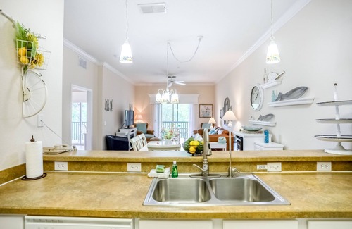 Bahama Bay Condo | 2nd floor condo with balcony, basketball court, near theme parks, & tennis court