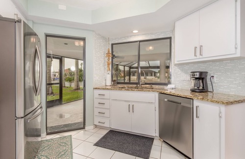 Pelican House | 3/2 updated Gulf access canal home heated pool & Jacuzzi - Coconut Cove
