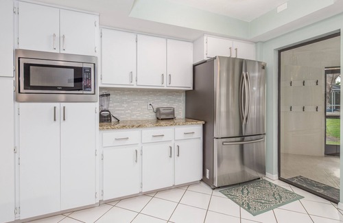 Pelican House | 3/2 updated Gulf access canal home heated pool & Jacuzzi - Coconut Cove