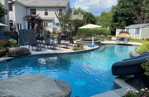 Herald Harbor House | 3 acre waterfront estate - heated pool, hot tub, yard, pier, game and pub room!