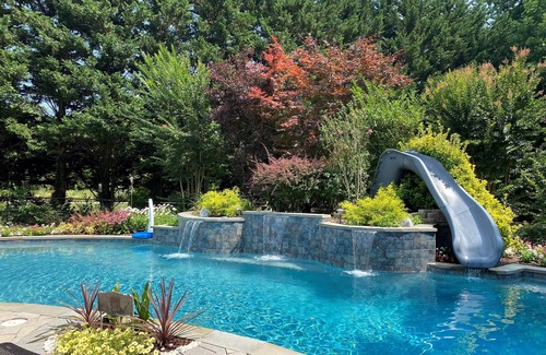 Herald Harbor House | 3 acre waterfront estate - heated pool, hot tub, yard, pier, game and pub room!