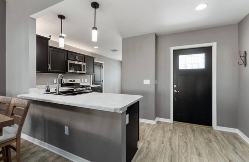 Wildwood House | 3 Bed 2 Bathroom Home in DeLuna with golf cart.