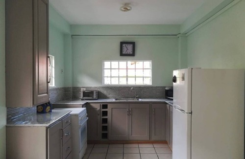 Goodwood Park Apartment | 3-bedroom apartment in terrific Diego Martin with WiFi, AC.
