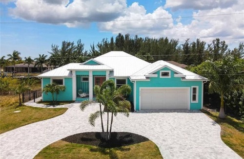 South Gulf Cove House | 3 Bedroom Home on a Canal with a Heated Pool