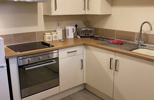 Tillicoultry House | 3 Bedroom lodge with hot tub and garden.