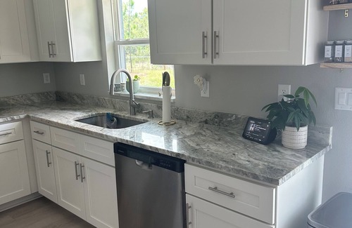 Brooksville House | 3 Bedroom Oasis close to the Gulf and Springs with fenced in backyard.