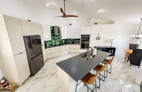 Saint James City House | 3-bedroom pool house on manatee-filled canal. BYOB: Bring your own boat