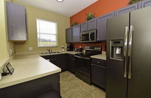 Wellington House | 3 bedroom villa (Sleeps 8) in a tropical Tuscan style resort near Disney