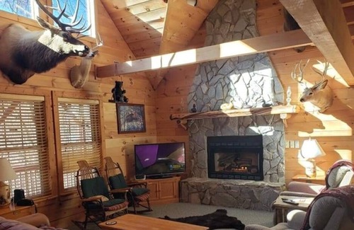 Maggie Valley Cabin | 3 BR 2 1/2 BA Log Home with Creekside View, Hot Tub, Game Room & Fire Pit!