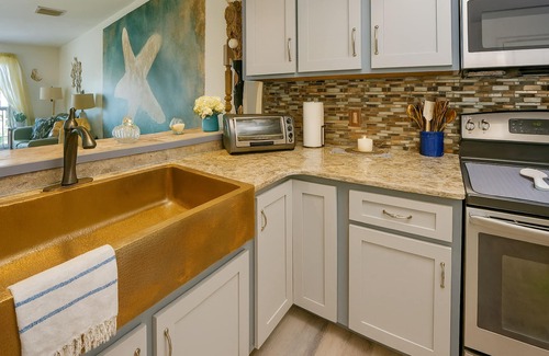 Bel Air Apartment | 3-Story Lagoon Haven: Dock & Resort Amentities