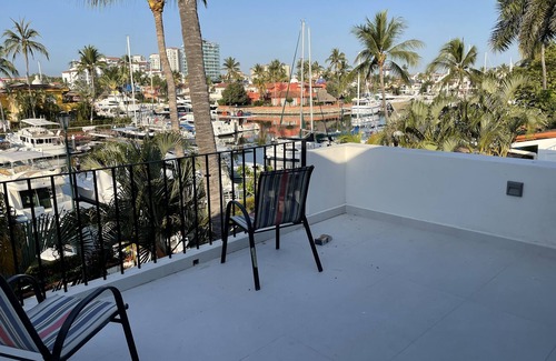 Isla Iguana Villa | 3 story villa on a private marina with beautiful views and great amenities.