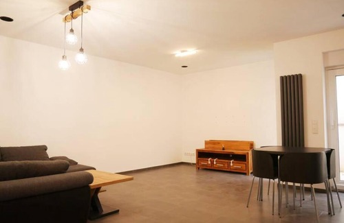 Gruenstadt Apartment | 3 ZKB Einliegerwohnung im Neubau (73m²) mit Ladesäule