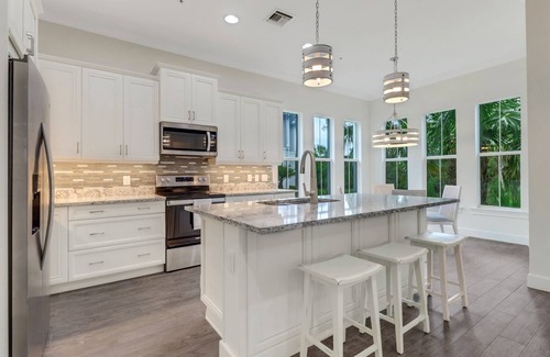 Isles of Collier Preserve Apartment | 30-day minimum lease | Isles of Collier | 3 bedrooms | 3 bathrooms | a den/office | sunroom | 2-car garage.