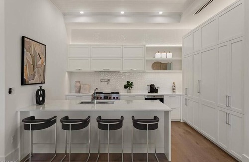 Old Naples Apartment | 30-day minimum lease | Mark on 8th | 3 bedrooms | 4 bathrooms | golf simulator