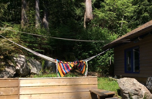 Tuwanek Cottage | 30 plus day rentals welcome. Hot tub, forest setting, steps to lovely little bay