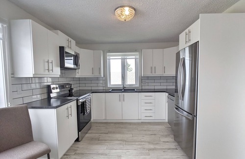 Caraquet House | 35% off your stay this July or August! Book Now!nFree coffee/tea and more!