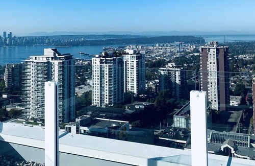 Central Lonsdale Condo | 360º Rooftop Patio Views... Your-Home-Away-From-Home