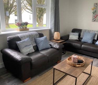 Scurlage House | 37 Gower holiday village Ty Seren Cosy 2 bedroom chalet with a seasonal pool