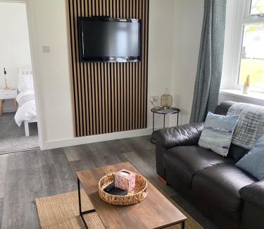 Scurlage House | 37 Gower holiday village Ty Seren Cosy 2 bedroom chalet with a seasonal pool