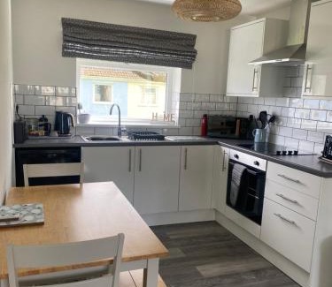 Scurlage House | 37 Gower holiday village Ty Seren Cosy 2 bedroom chalet with a seasonal pool