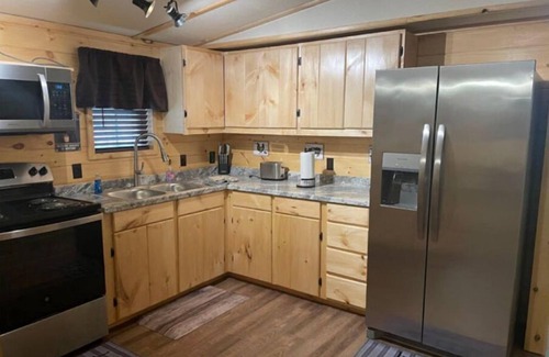 Lejunior Cabin | 3BR, 2 Bath Cabin with full kitchen, living room, and hot tub.
