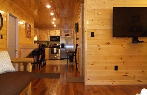 Lejunior Cabin | 3BR 2 Bath house with full kitchen, living room, and hot tub.