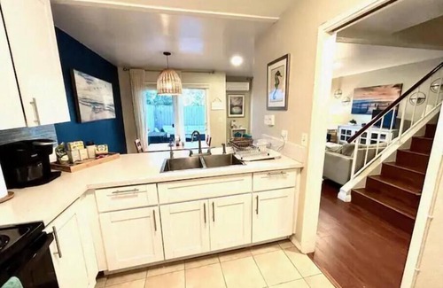 Swan Canyon Apartment | 3BR/3BA Coastal themed Townhome w/Private parking! Centrally located! Patio/BBQ