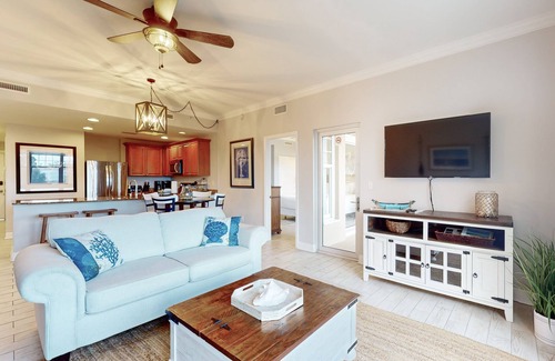 Upper Grand Lagoon Condo | 3rd-floor beach & pool-view condo with outdoor pool, hot tub, grills, balcony
