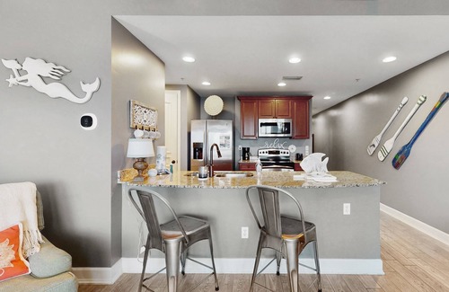 Upper Grand Lagoon Condo | 3rd-floor beach view condo with Pool, Hot tub, & private balcony