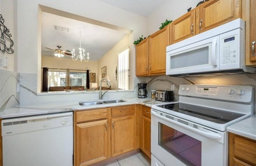 Regal Palms House | 4 bdrm townhouse - 2 king size bdrm suites; next to pool, lazy river and Disney!