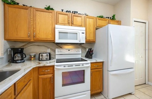 Regal Palms House | 4 bdrm townhouse - 2 king size bdrm suites; next to pool, lazy river and Disney!