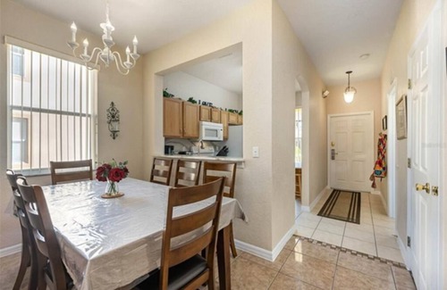 Regal Palms House | 4 bdrm townhouse - 2 king size bdrm suites; next to pool, lazy river and Disney!