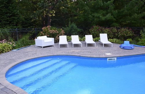 Southold House | 4 Bed/2.5 Bath Stunning North Fork retreat with Heated Pool & Hot Tub