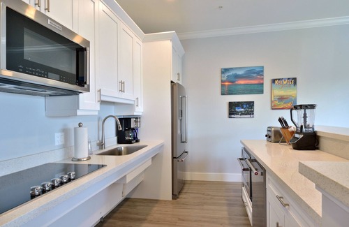 Meadows Condo | 4-Bed, 3-Bath Waterfront Condo at Bayfront Suites & Marina - NO CLEANING FEE