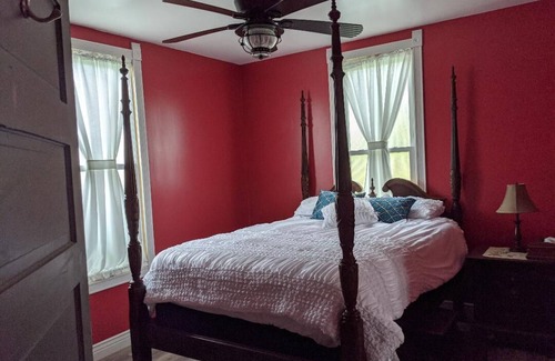 Bayside House | 4 Bed/Bath, a porch view of Copano Bay in the serene little village of Bayside