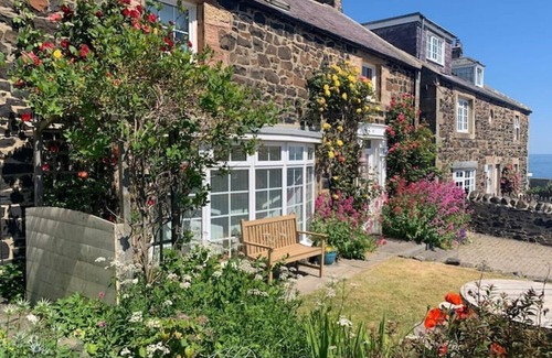 Craster Cottage | 4 bed cottage with parking and views in Craster