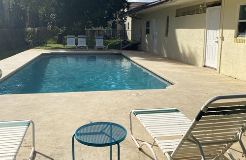 Coral Springs House | 4-Bedroom Cozy Home With a Resort Style Pool
