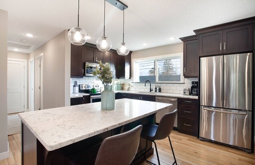 Southwest Calgary House | 4-bedroom detached home with recreation room and hot tub!