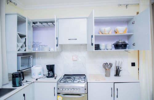 Kigali House | 4-bedroom estate in welcoming Kigali-Rwanda with WiFi in a family-friendly area.