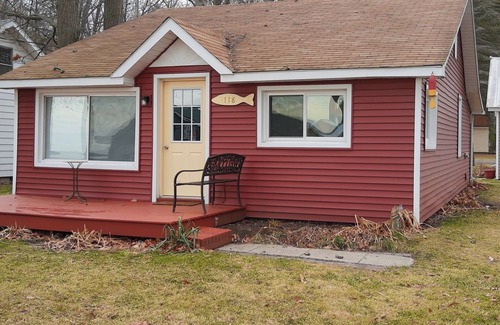 Tawas City House | 4 bedroom home, View and Access to Lake Tawas. Kayaks. Sleeps 9. King Bed.