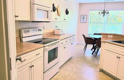Warrenville House | 4-bedroom house in beautiful Warrenville with WiFi, AC. Start your getaway now