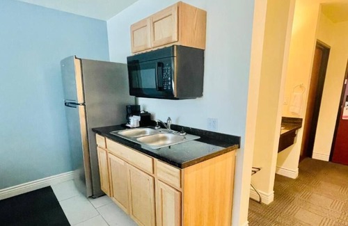 Cuero House | 4 Double Queen With Kitchenette at FairBridge Inn & Suites Cuero!