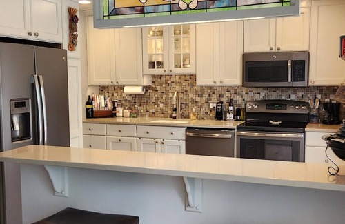 Saratoga Springs House | 4 minutes from Saratoga Racetrack, this home is clean & cozy, with private deck