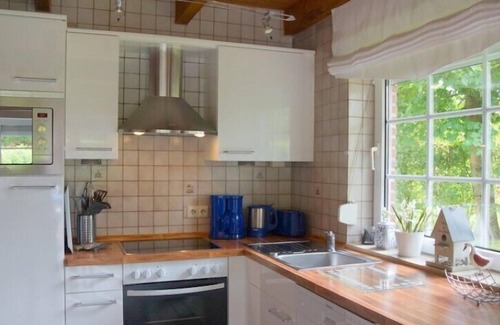 Norderteil House | 4 person vacation home, garden with fence and gate