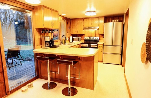 Port Angeles East House | 4 Season River Retreat