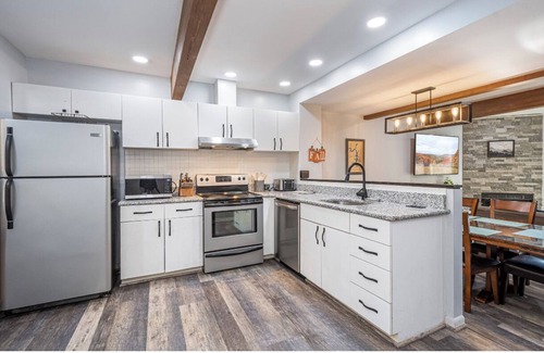 McHenry House | 4 Seasons Wisp - Ski In/Ski Out Townhome with Lake Access, Hot Tub