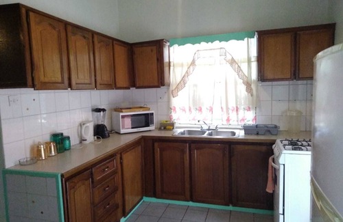 Bois d'Orange Condo | 4 separate single bedrooms,bathrooms,living and kitchen.beach access