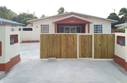 Bois d'Orange Condo | 4 separate single bedrooms,bathrooms,living and kitchen.beach access